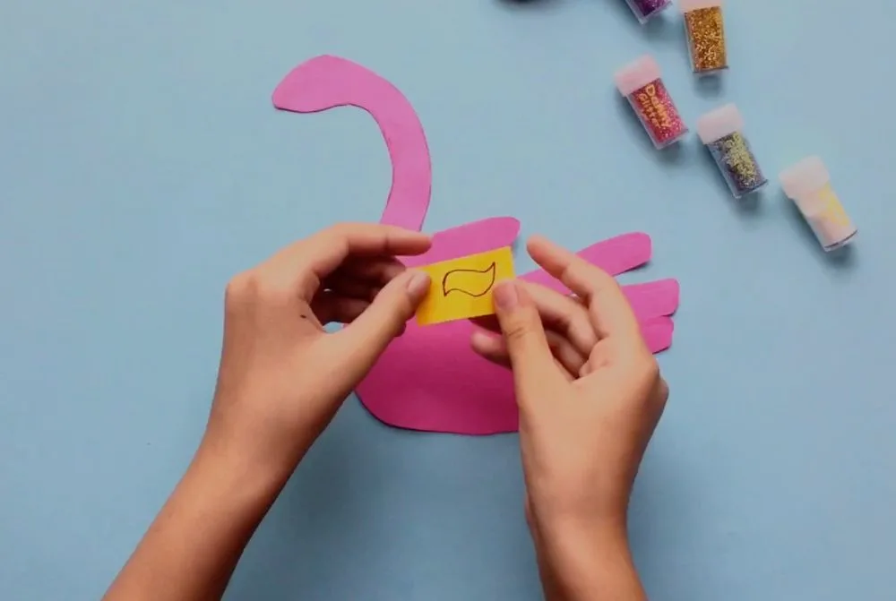 How to Make a Flamingo Birthday Card with Easy Steps (for Kids) Draw beak on yellow paper