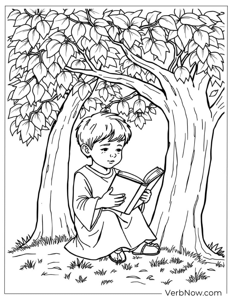 Boy sitting under a tree reading the Bible
