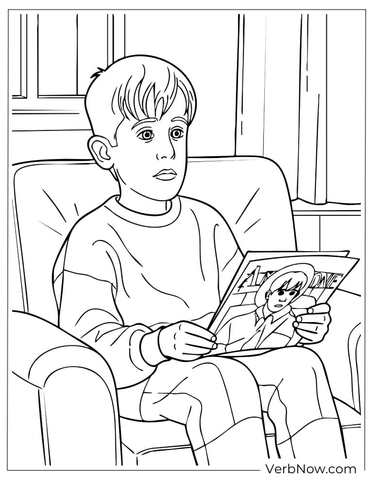Kevin reading a magazine in a chair