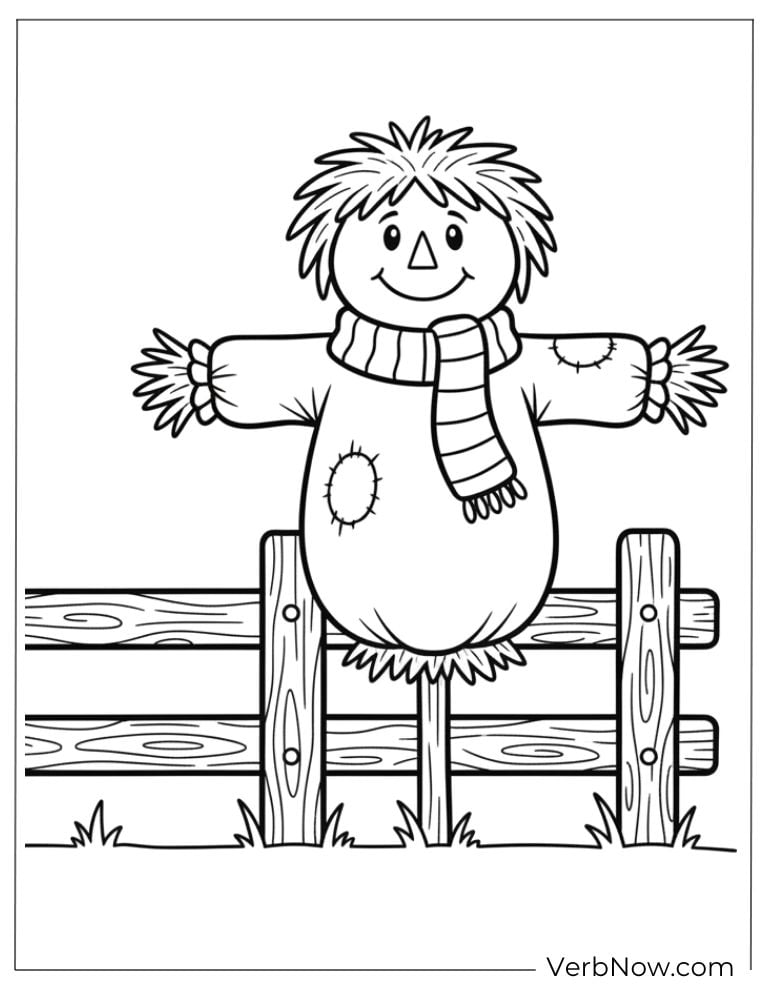 Cute scarecrow leaning on a wooden fence